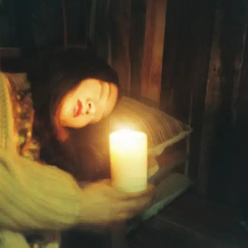 Single cover: SPILLING CANDLES