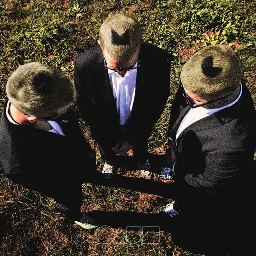 Single cover: STRAPPED